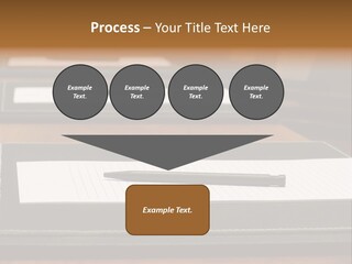 A Table With A Pen And Paper On It PowerPoint Template