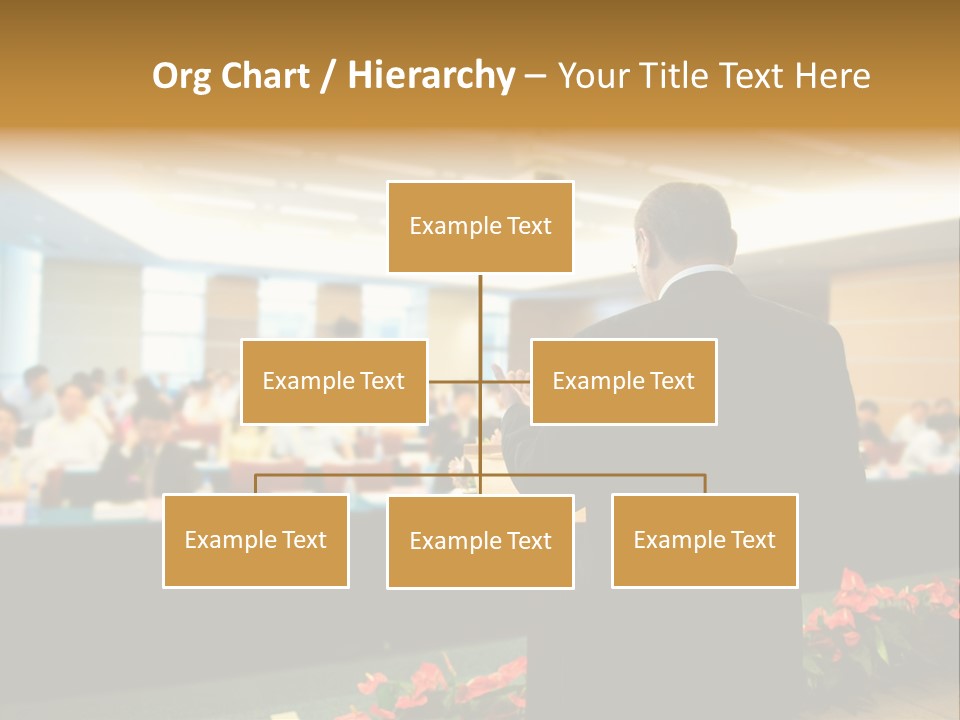 A Man Standing At A Podium In Front Of A Crowd Of People PowerPoint Template