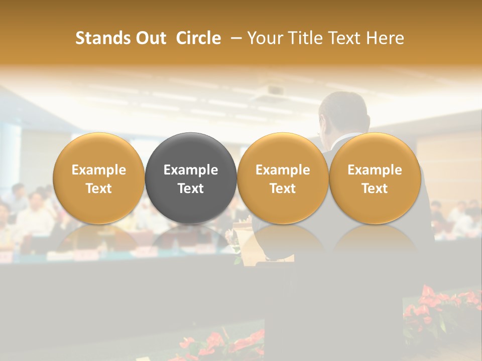 A Man Standing At A Podium In Front Of A Crowd Of People PowerPoint Template