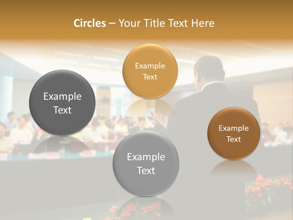 A Man Standing At A Podium In Front Of A Crowd Of People PowerPoint Template