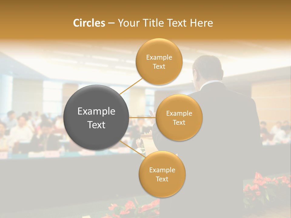 A Man Standing At A Podium In Front Of A Crowd Of People PowerPoint Template