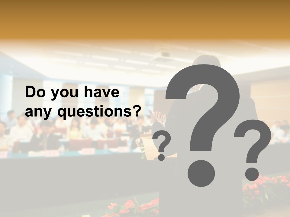 A Man Standing At A Podium In Front Of A Crowd Of People PowerPoint Template