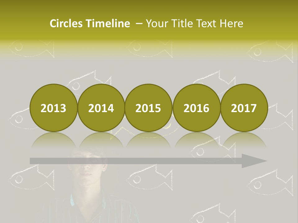 A Man Standing In Front Of A Blackboard With Fish Drawn On It PowerPoint Template