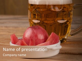 A Mug Of Beer And Onion Slices On A Table PowerPoint Template