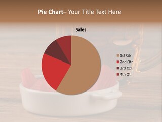 A Mug Of Beer And Onion Slices On A Table PowerPoint Template