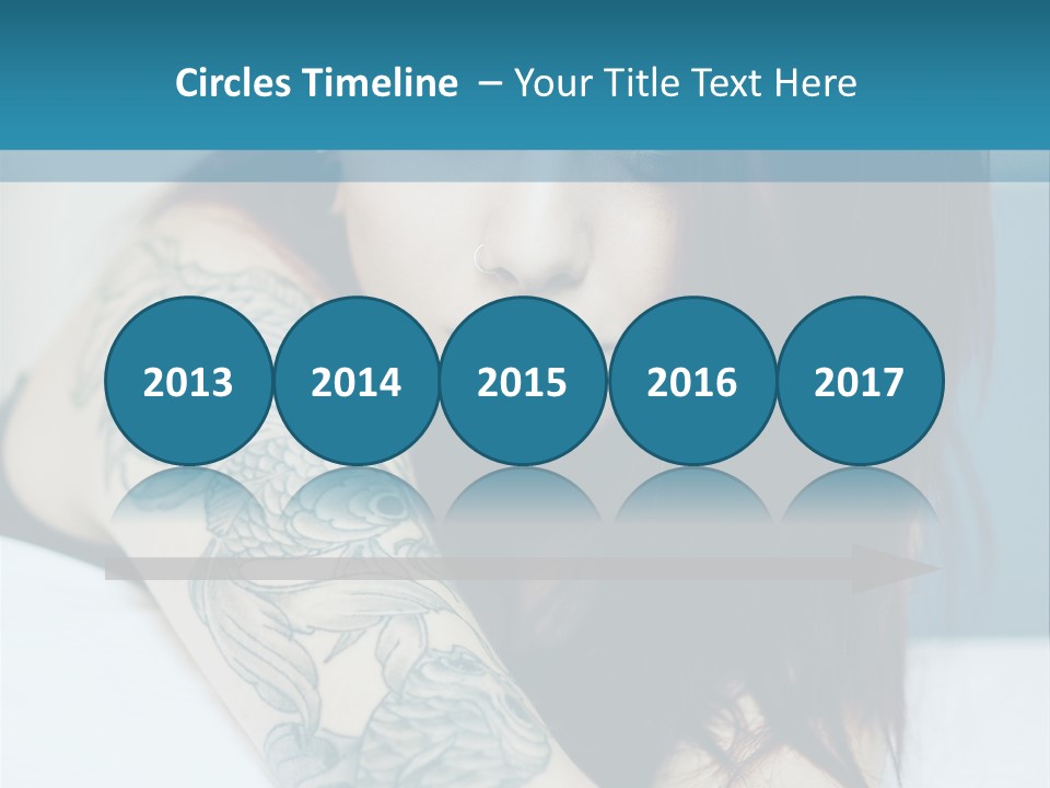 A Woman With Red Hair And Tattoos On Her Arm PowerPoint Template