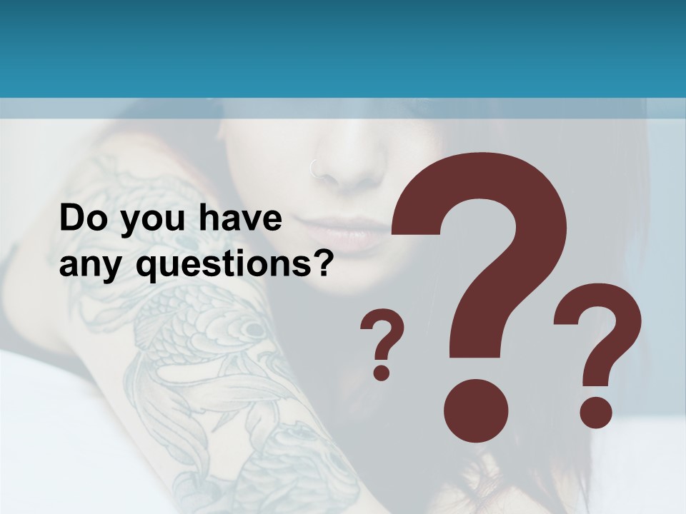 A Woman With Red Hair And Tattoos On Her Arm PowerPoint Template