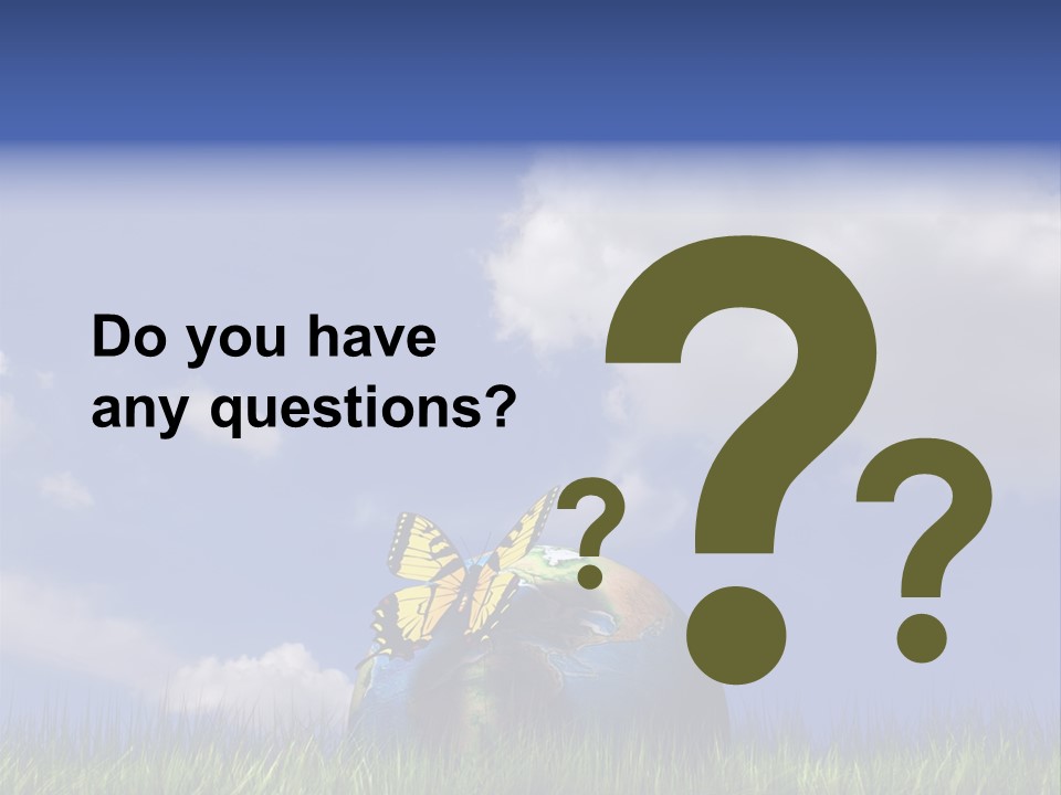 A Butterfly Sitting On Top Of A Ball In The Grass PowerPoint Template
