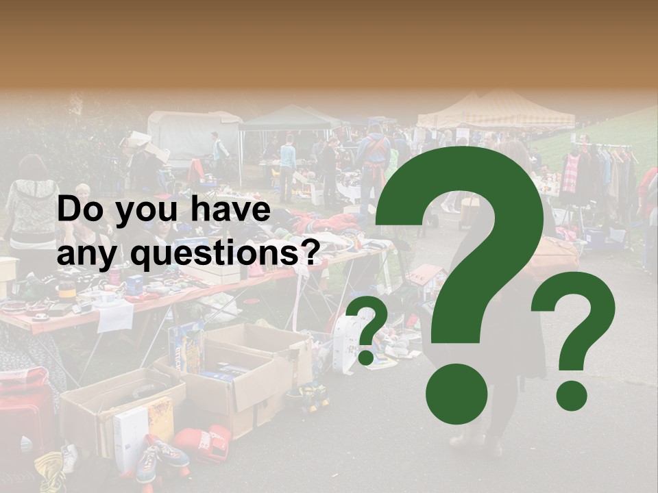 A Group Of People Standing Around A Table With Many Items On It PowerPoint Template