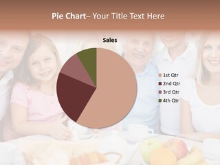 A Group Of People Sitting At A Table With Food PowerPoint Template