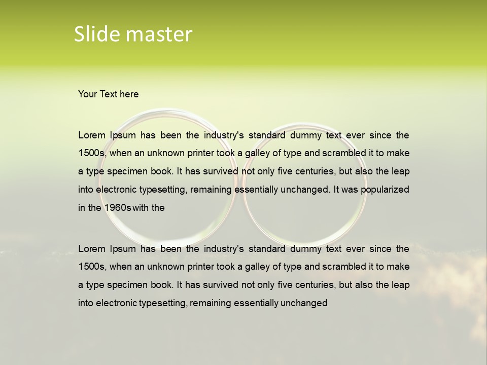 Two Wedding Rings Sitting On A Piece Of Wood PowerPoint Template