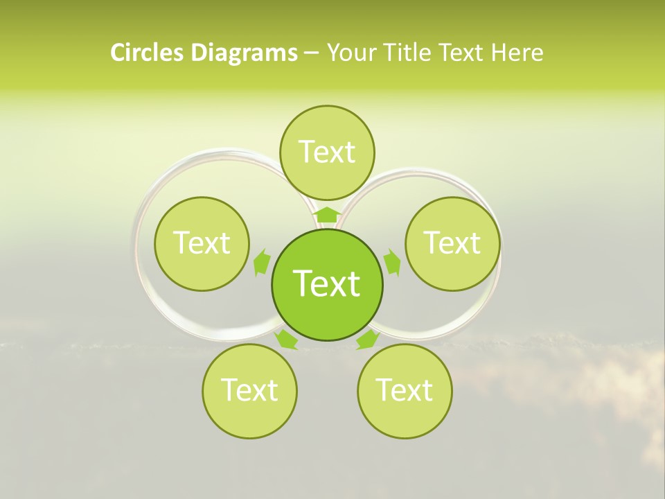 Two Wedding Rings Sitting On A Piece Of Wood PowerPoint Template