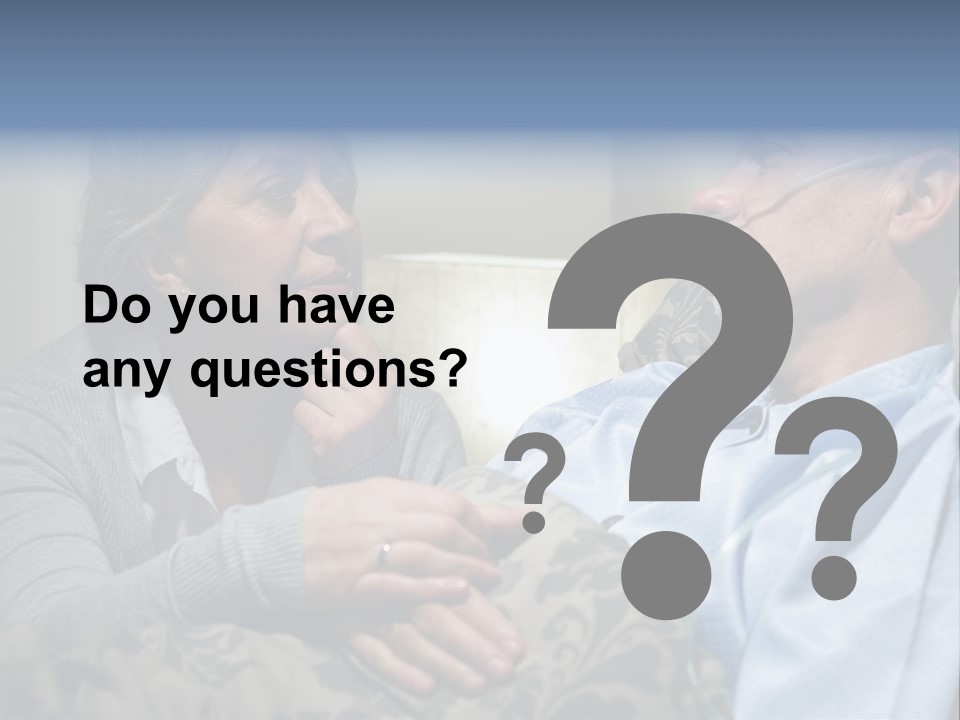 A Man Sitting Next To A Woman On A Couch PowerPoint Template
