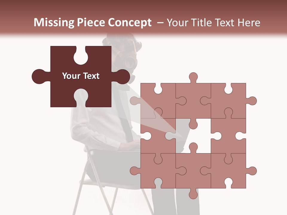 A Man Sitting On A Chair Using A Laptop Computer PowerPoint Template