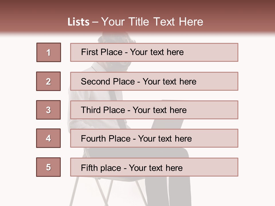 A Man Sitting On A Chair Using A Laptop Computer PowerPoint Template