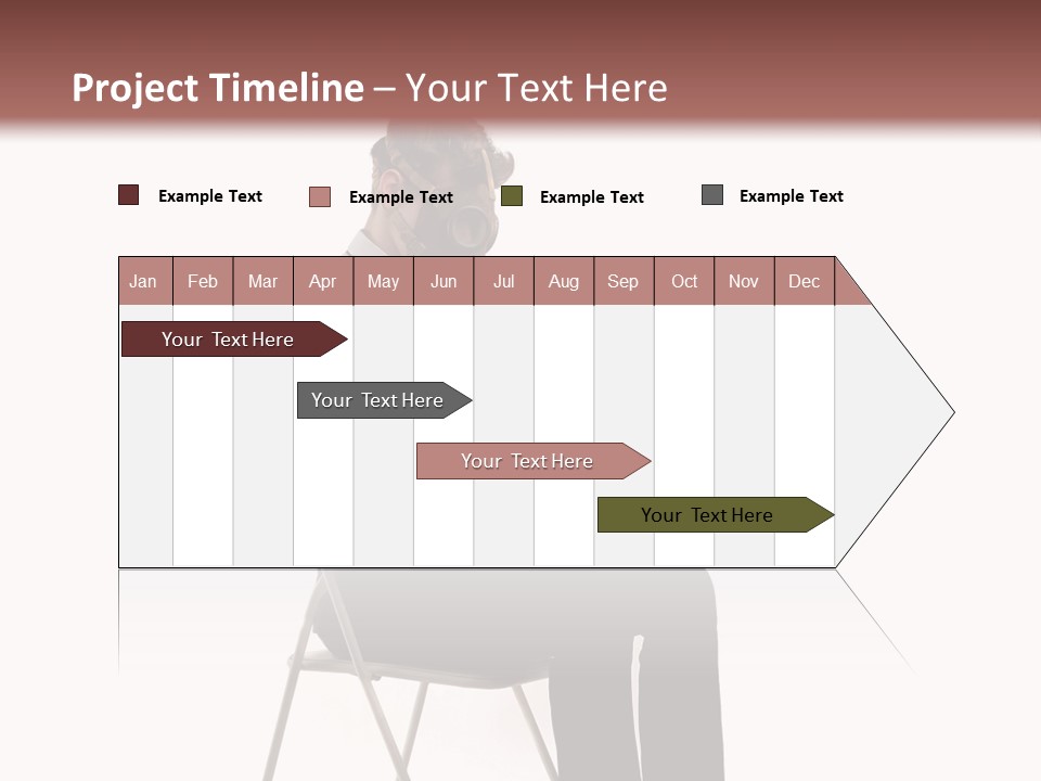A Man Sitting On A Chair Using A Laptop Computer PowerPoint Template