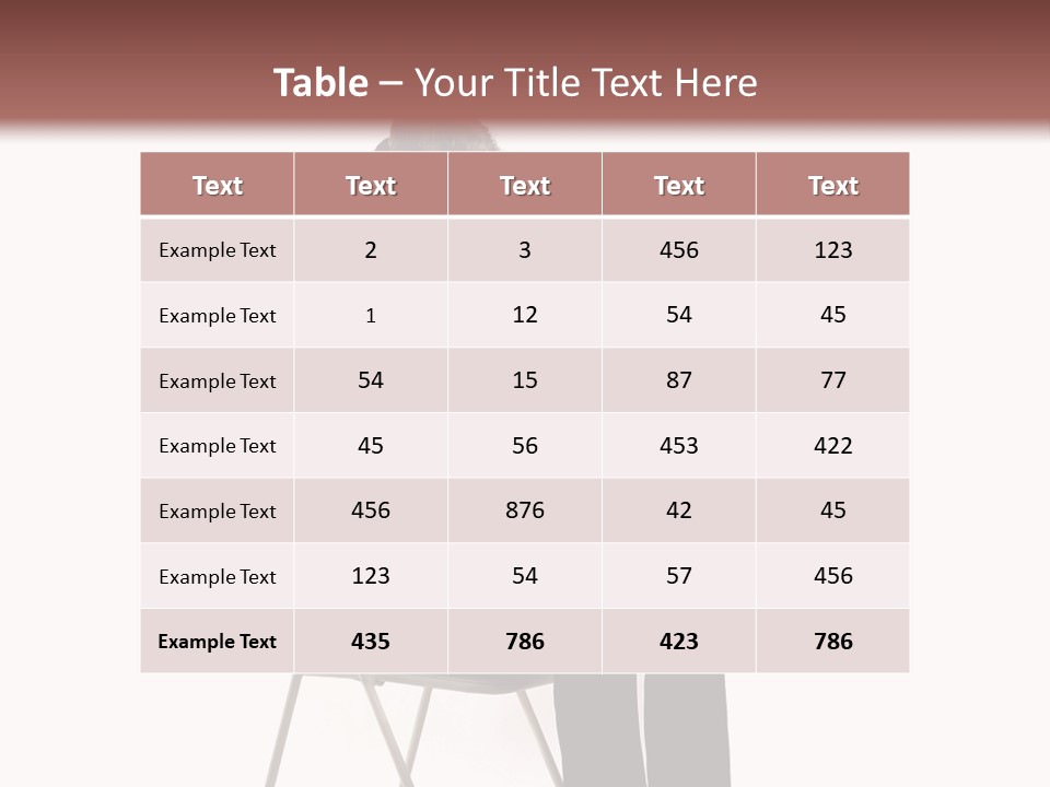 A Man Sitting On A Chair Using A Laptop Computer PowerPoint Template