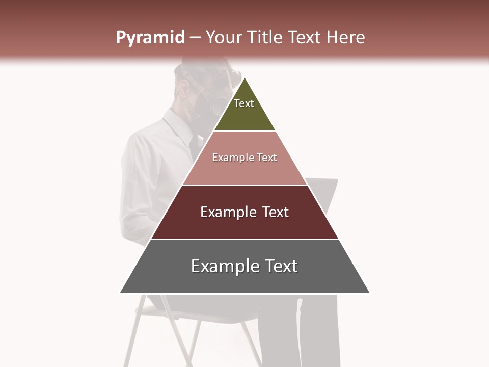 A Man Sitting On A Chair Using A Laptop Computer PowerPoint Template