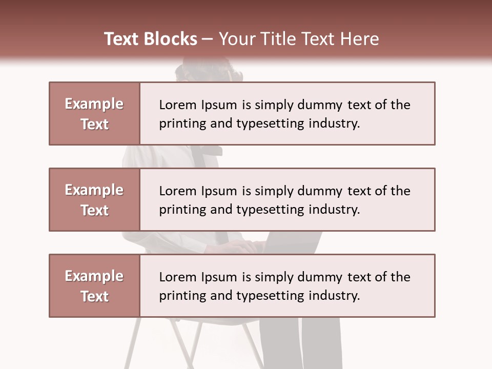 A Man Sitting On A Chair Using A Laptop Computer PowerPoint Template