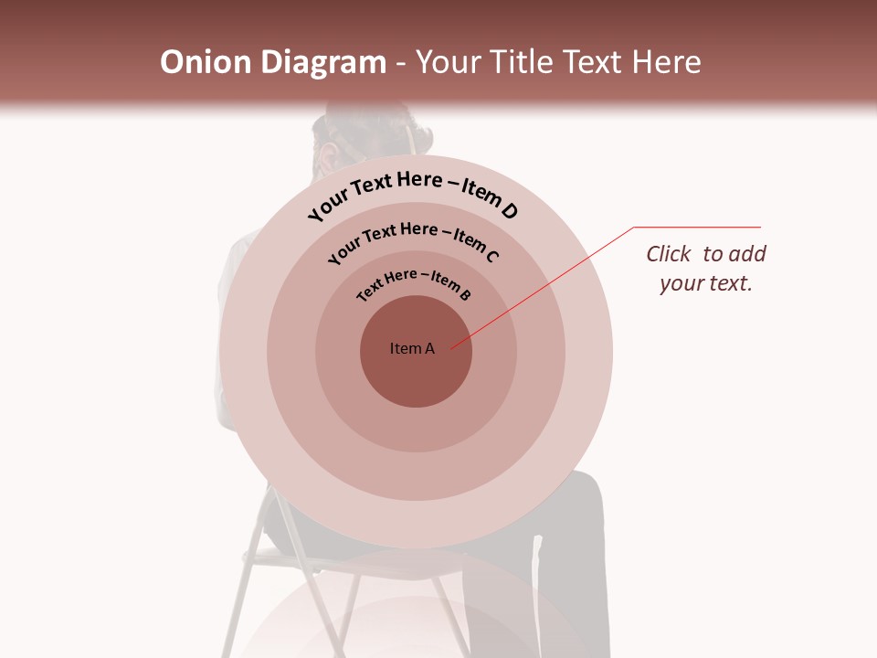 A Man Sitting On A Chair Using A Laptop Computer PowerPoint Template