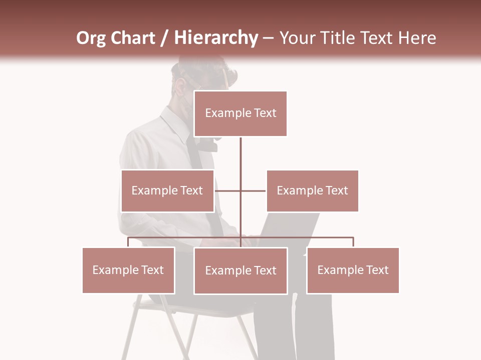 A Man Sitting On A Chair Using A Laptop Computer PowerPoint Template