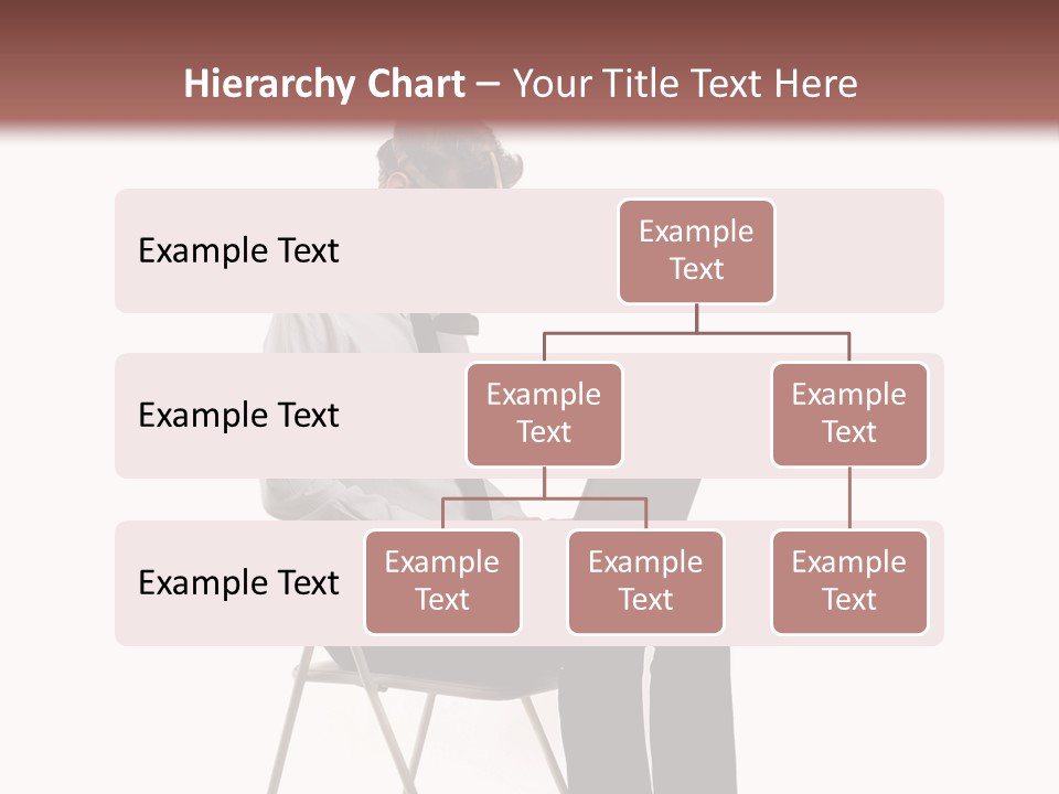 A Man Sitting On A Chair Using A Laptop Computer PowerPoint Template