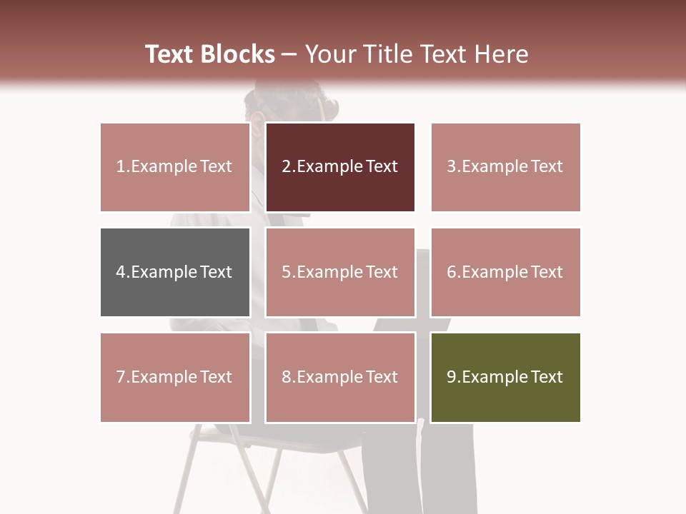 A Man Sitting On A Chair Using A Laptop Computer PowerPoint Template