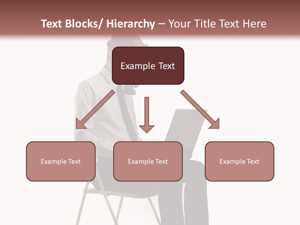 A Man Sitting On A Chair Using A Laptop Computer PowerPoint Template