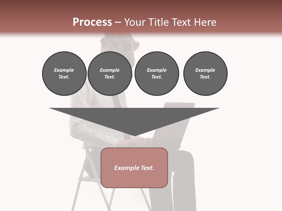 A Man Sitting On A Chair Using A Laptop Computer PowerPoint Template