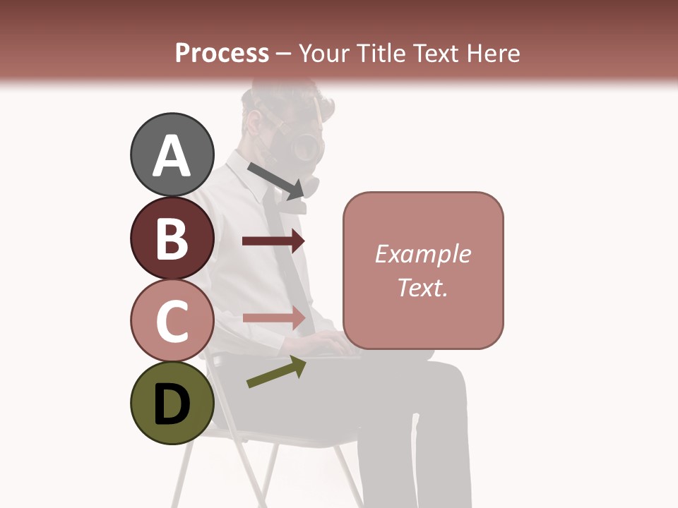A Man Sitting On A Chair Using A Laptop Computer PowerPoint Template