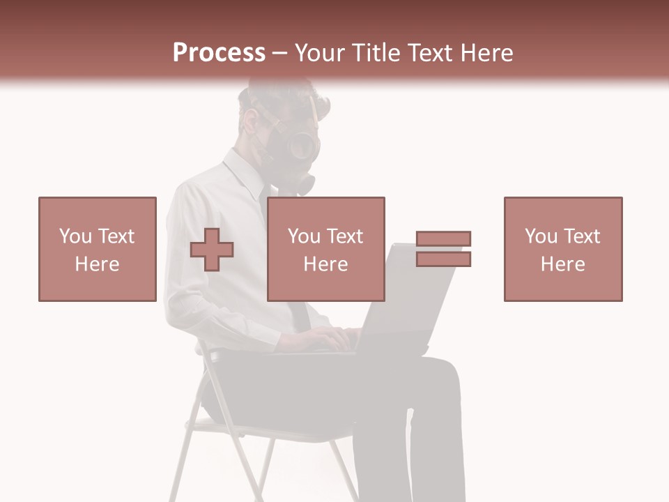A Man Sitting On A Chair Using A Laptop Computer PowerPoint Template