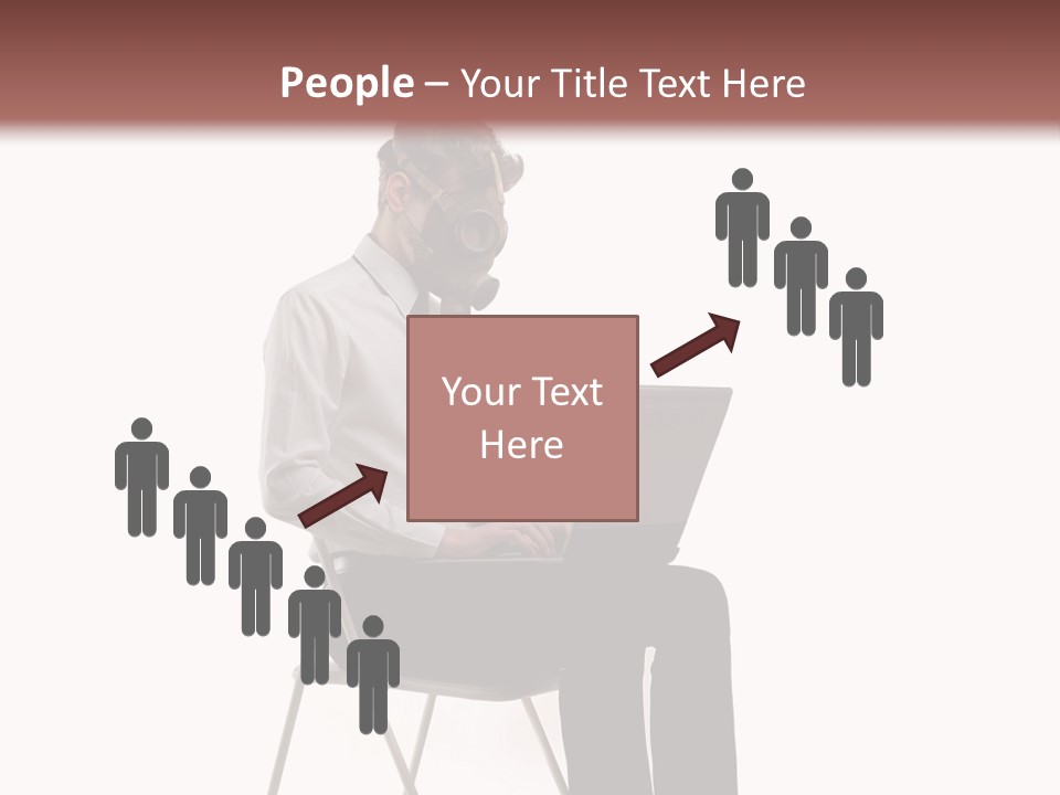 A Man Sitting On A Chair Using A Laptop Computer PowerPoint Template