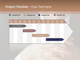 A Man In A Suit Leaning Against A Wall PowerPoint Template