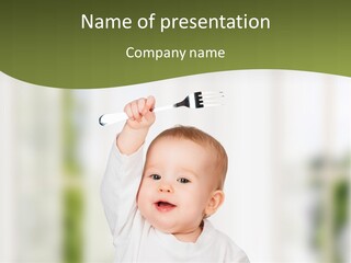 A Baby Holding A Fork And Knife In His Hand PowerPoint Template