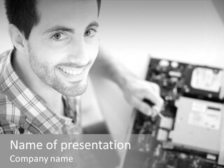 A Man Is Holding A Laptop Computer In His Hands PowerPoint Template