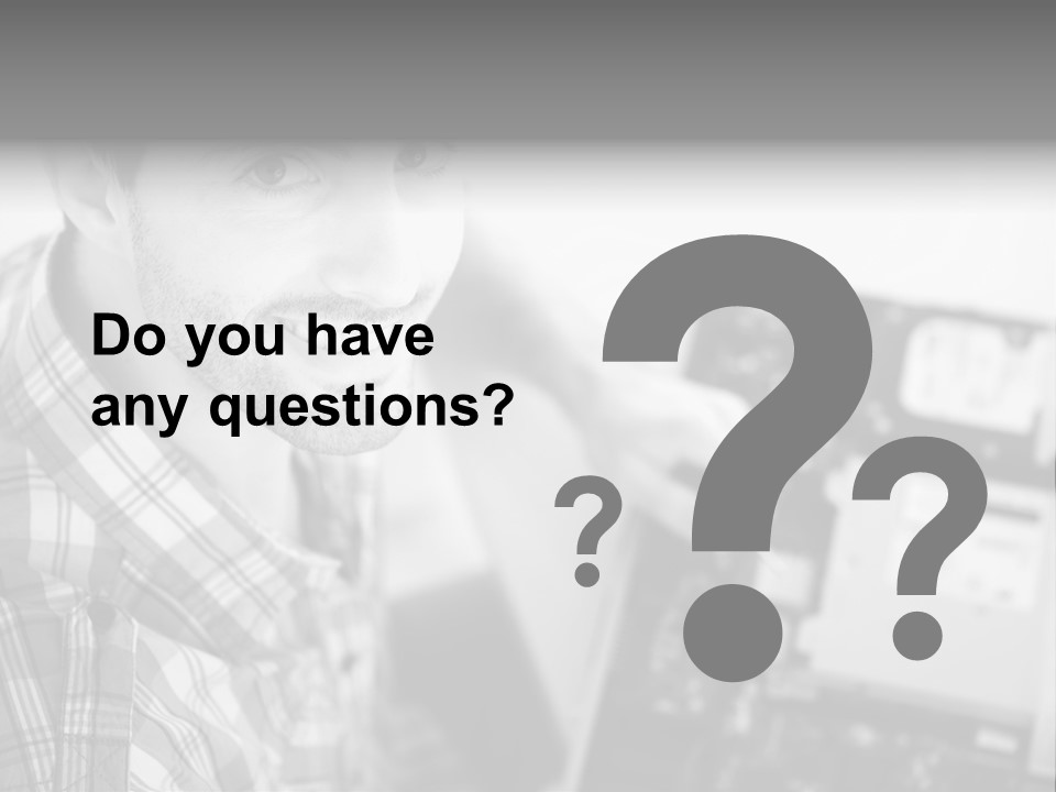 A Man Is Holding A Laptop Computer In His Hands PowerPoint Template