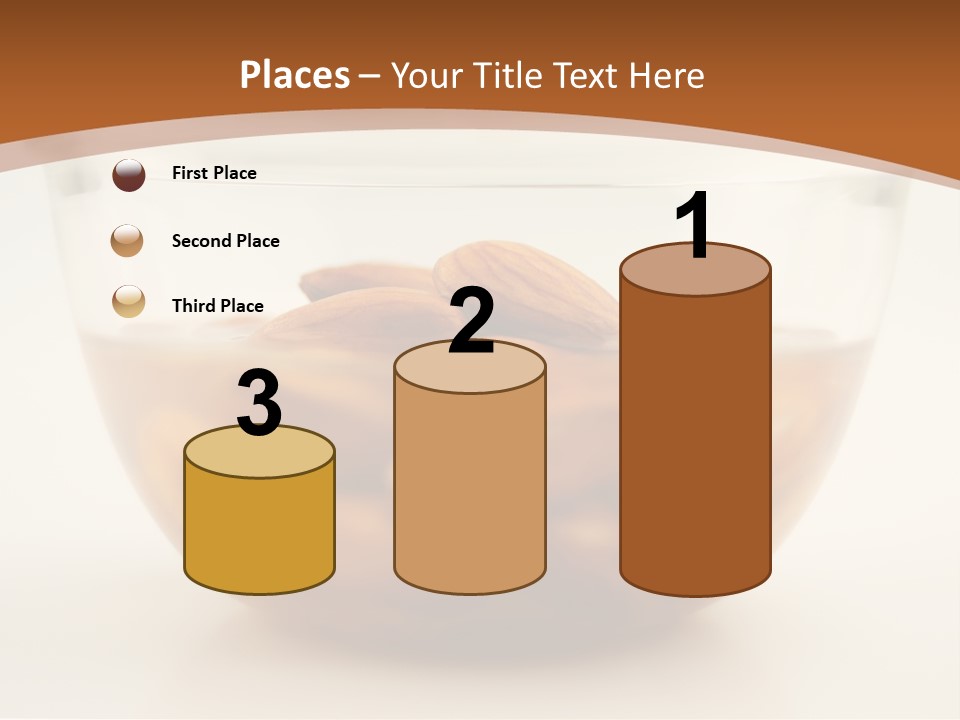 A Glass Bowl Filled With Almonds On Top Of A Table PowerPoint Template
