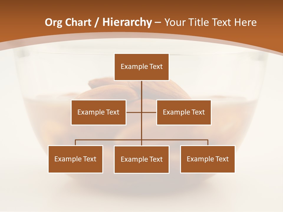 A Glass Bowl Filled With Almonds On Top Of A Table PowerPoint Template