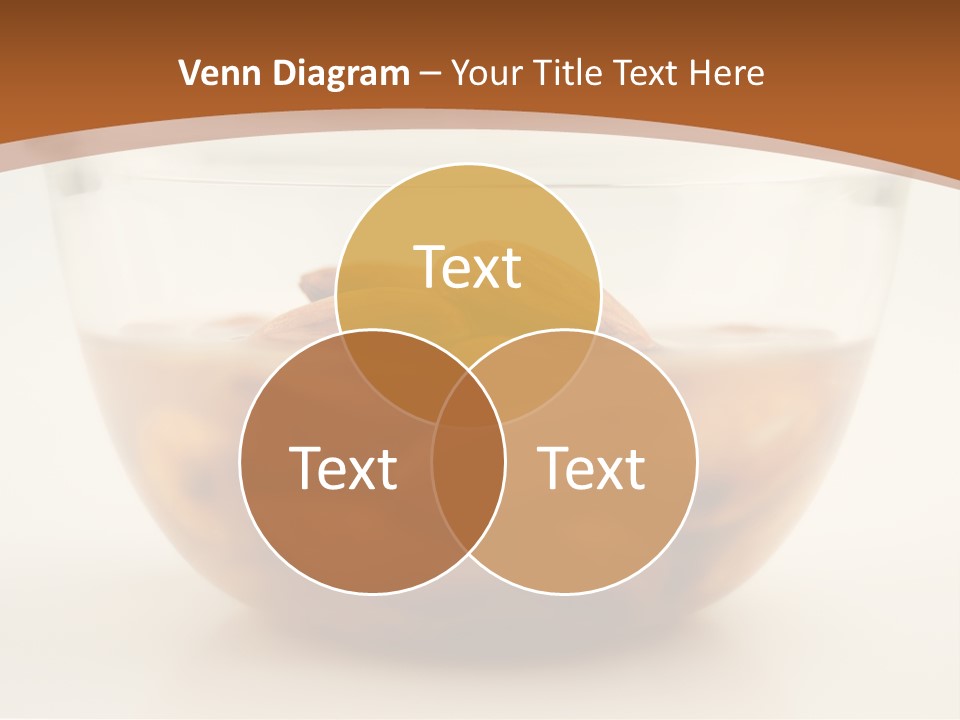 A Glass Bowl Filled With Almonds On Top Of A Table PowerPoint Template