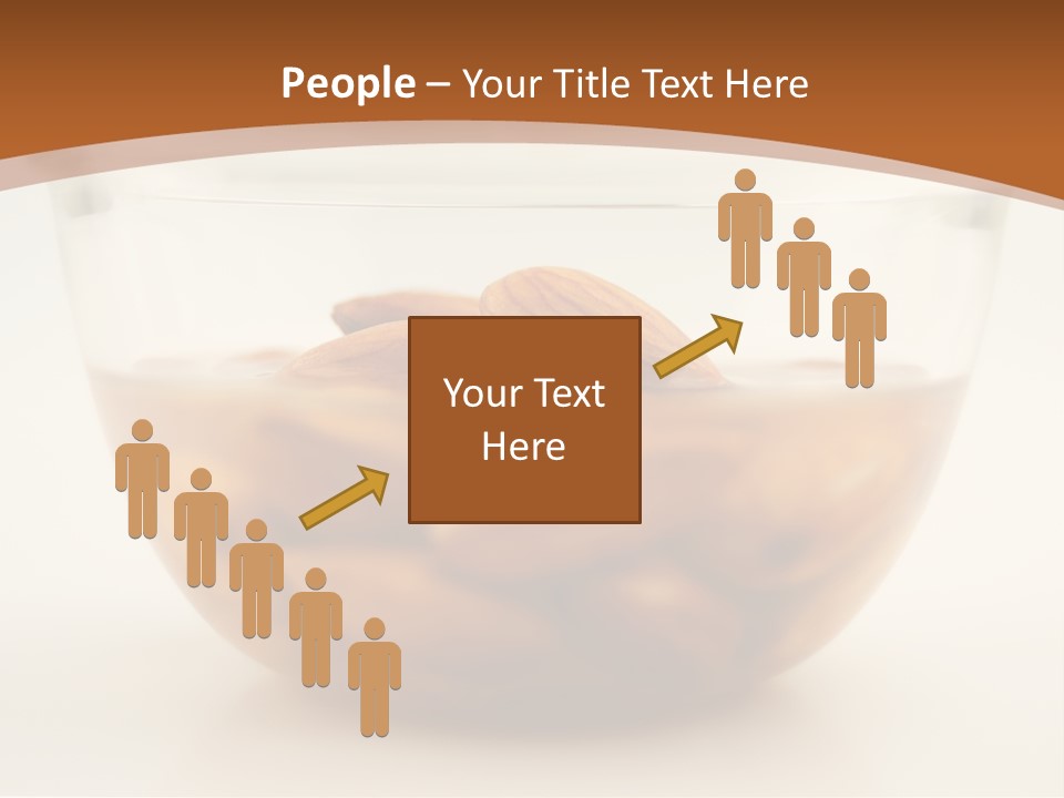 A Glass Bowl Filled With Almonds On Top Of A Table PowerPoint Template