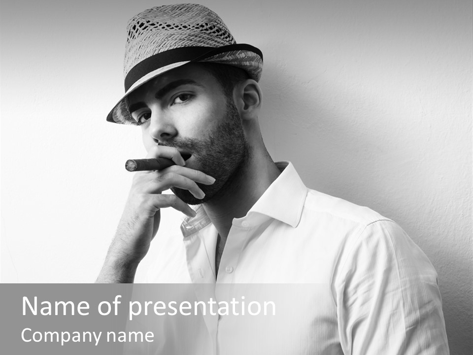 A Man In A Hat Is Smoking A Cigarette PowerPoint Template