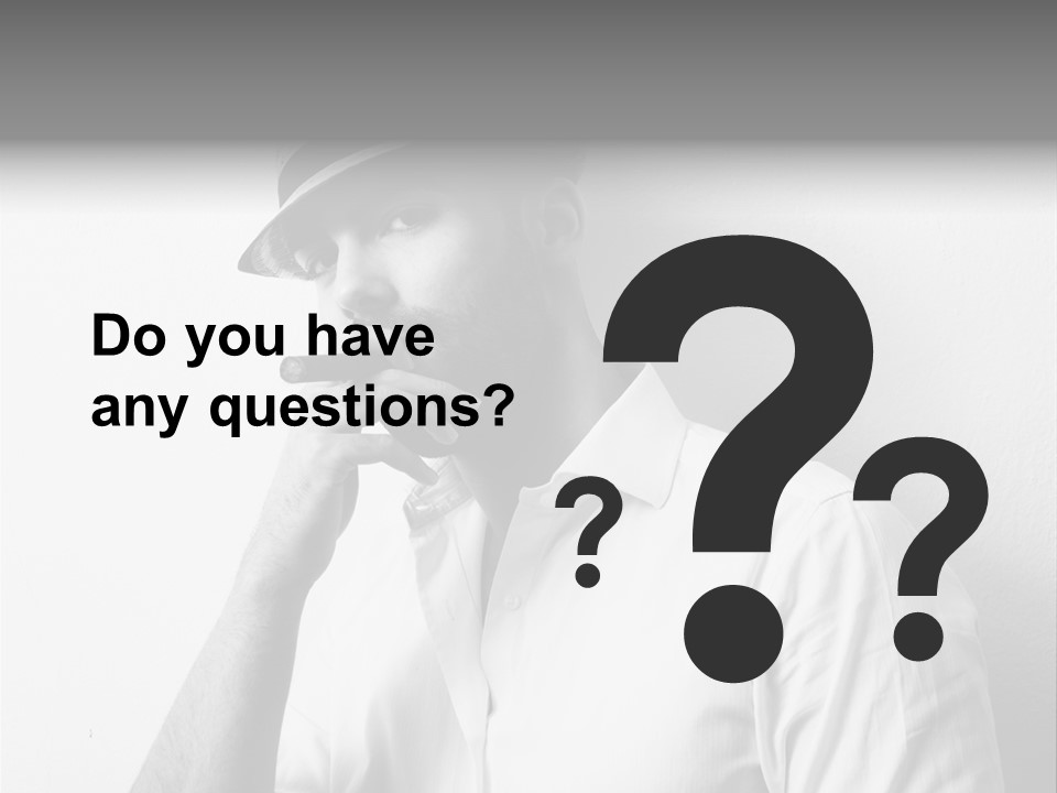 A Man In A Hat Is Smoking A Cigarette PowerPoint Template