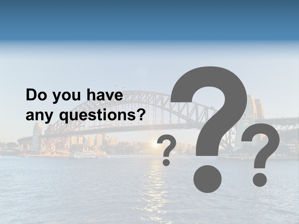 A Bridge Over A Body Of Water With A City In The Background PowerPoint Template