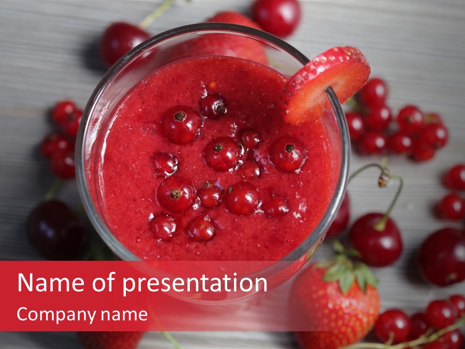 A Red Drink With Cherries On A Wooden Table PowerPoint Template