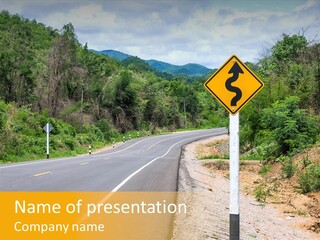 A Road Sign On The Side Of A Road PowerPoint Template
