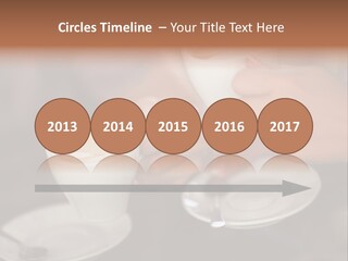 A Couple Of People Holding Cups Of Coffee PowerPoint Template