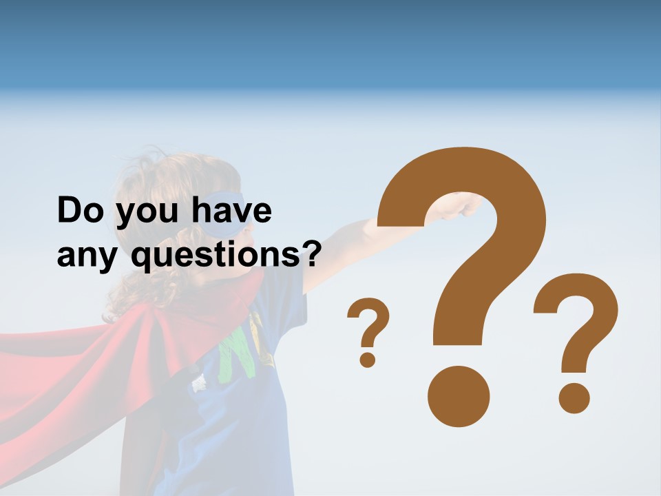 A Young Boy Dressed As A Super Hero PowerPoint Template