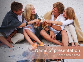 A Group Of People Sitting Around A Campfire Toasting PowerPoint Template