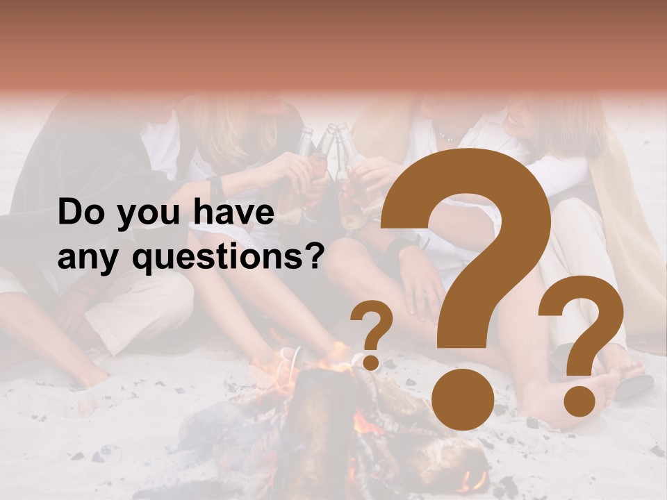 A Group Of People Sitting Around A Campfire Toasting PowerPoint Template