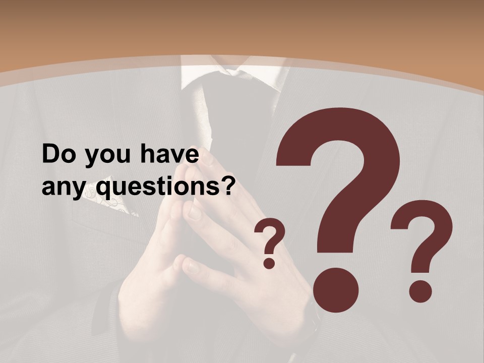 A Man In A Suit Is Holding His Hands Together PowerPoint Template